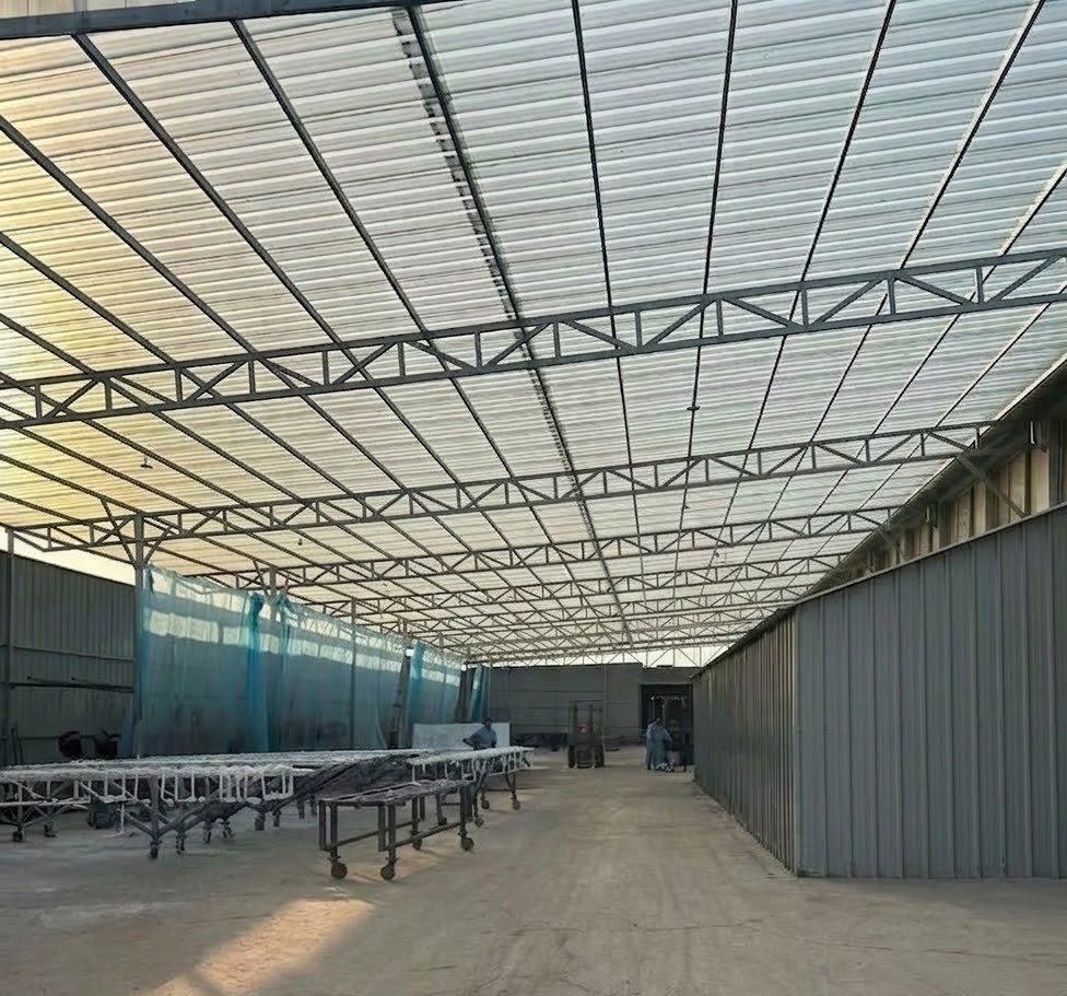 Open-plan industrial workshop floor designed for efficient heavy plate fabrication and welding.