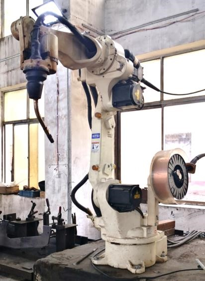 Industrial robotic arm for automated precision metal welding