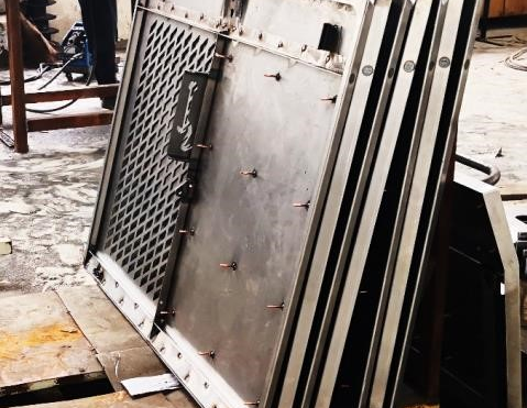 Precision sheet metal equipment housing and enclosure door panel fabrication - KS Metal Pro