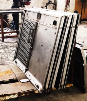 Custom industrial metal enclosure door panel for machinery housing